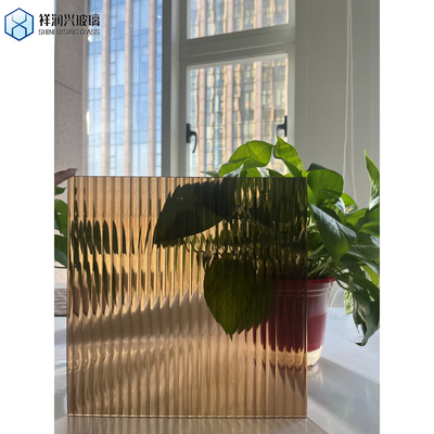 Vidro decorativo com padrão em bronze azul verde claro com desenho de pontos de chuva